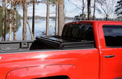Lund 99-17 Ford F-250 Super Duty Styleside (6.8ft. Bed) Hard Fold Tonneau Cover - Black